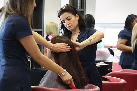 Students working in the hair and beauty salon